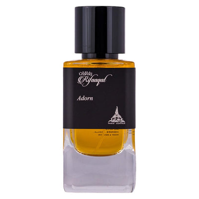 Rifaaqat Adorn Eau de Parfum 85ml från Paris Corner: en elegant, maskulin doft med kryddiga och träiga inslag för alla tillfällen.