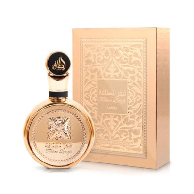 Fakhar Gold Extrait de Parfum 100ml från Lattafa - en lyxig unisex-doft med fruktiga, blommiga och träiga noter för en bestående inverkan.